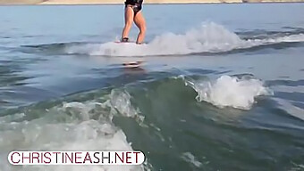 Christine Ash, A Busty Milf, Shows Off Her Abs And Ass While Waterskiing In Public